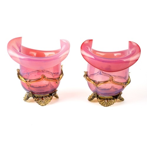 503A - A pair of Victorian pink and green vaseline glass vases, approx. 14.5cm high.