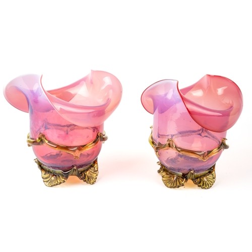 503A - A pair of Victorian pink and green vaseline glass vases, approx. 14.5cm high.