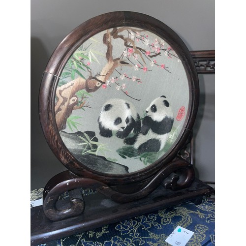 392 - A Chinese silk and embroidered panel of Pandas, signed within circular frame and mount, fitted box t... 