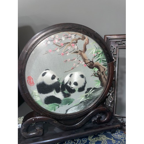 392 - A Chinese silk and embroidered panel of Pandas, signed within circular frame and mount, fitted box t... 