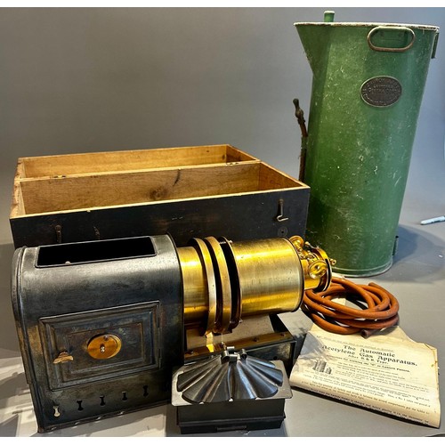 414 - A late 19th Century tin plate and brass magic lantern with Stocks patent lamp, in tinplate carrying ... 