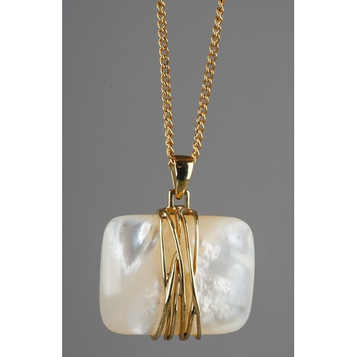 1 - A 9ct yellow gold and mother of pearl pendant, on a 9ct gold chain, total gross weight approx 12.2g