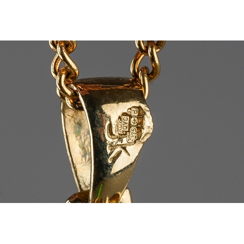 1 - A 9ct yellow gold and mother of pearl pendant, on a 9ct gold chain, total gross weight approx 12.2g