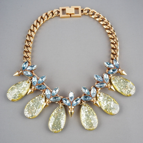 13 - Mawi London - a gold-plated statement necklace, heavy gauge curb-link chain set with blue paste and ... 