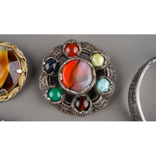 25 - Costume jewellery, including a Scottish agate and hardstone brooch; paste brooches; bangle; etc