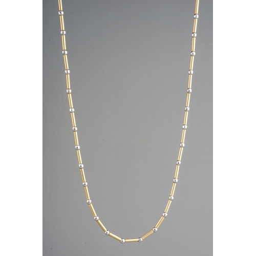 46 - A 9ct yellow gold necklace, with yellow gold tubular links and white gold faceted bead spacers, appr... 