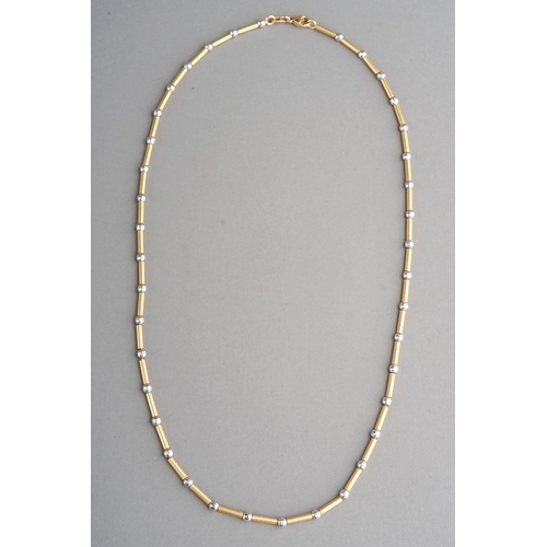 46 - A 9ct yellow gold necklace, with yellow gold tubular links and white gold faceted bead spacers, appr... 