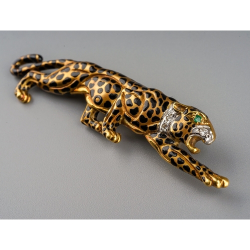 48 - An 18k yellow gold leopard brooch, in the Cartier style, black enamelled spots, emerald eye and diam... 