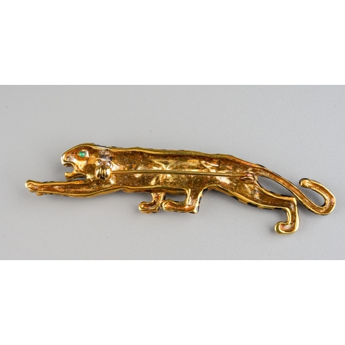 48 - An 18k yellow gold leopard brooch, in the Cartier style, black enamelled spots, emerald eye and diam... 