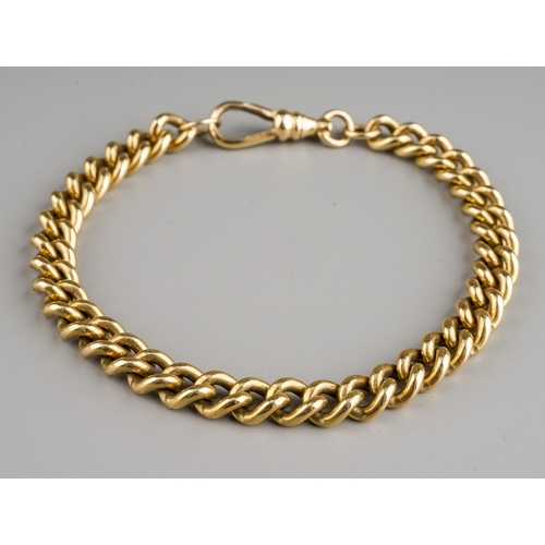 52 - A 9ct yellow gold curb-link bracelet, dog clip clasp, 9cm long, stamped '9ct' to inner clasp, gross ... 