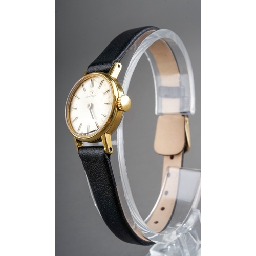 56 - A ladies gold plated Omega wristwatch, 18mm circular dial, baton indicators, black leather strap, bo... 