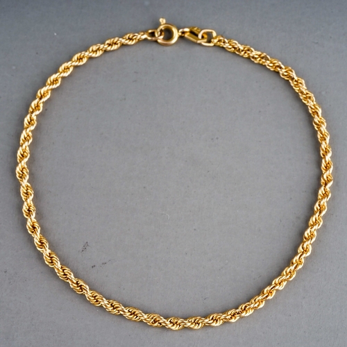 64 - A 9k yellow gold rope-twist bracelet, approx 19.5cm long, gross weight approx 1.6g