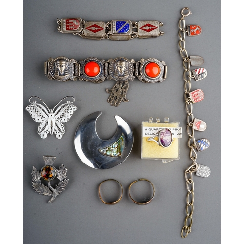 67 - A collection of white metal jewellery, including enamelled souvenir bracelets, filigree brooch, blue... 