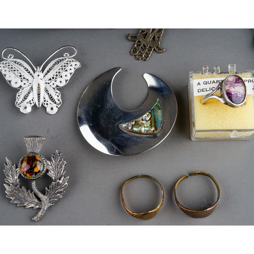 67 - A collection of white metal jewellery, including enamelled souvenir bracelets, filigree brooch, blue... 