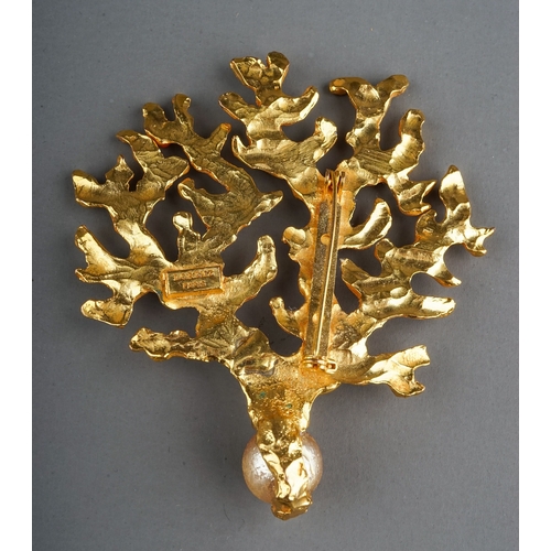 73 - Lorenz Paris - a large gold-plated brooch in the form of a coral branch, set with coral coloured gla... 