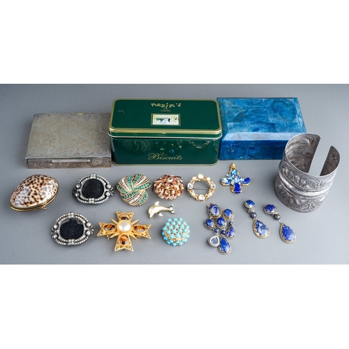 76 - Costume jewellery, including a large silver cuff, probably Egyptian; a set of silver and lapis lazul... 