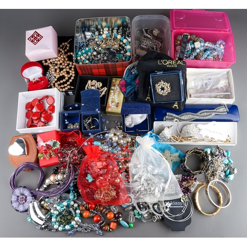 77 - A large collection of costume jewellery, including silver rings, chains, beads, watches, pearls, etc