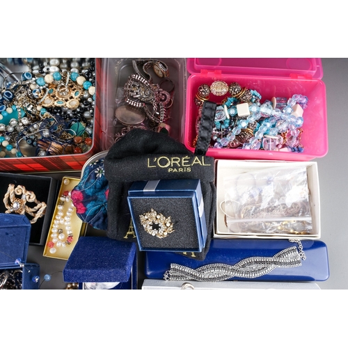 77 - A large collection of costume jewellery, including silver rings, chains, beads, watches, pearls, etc