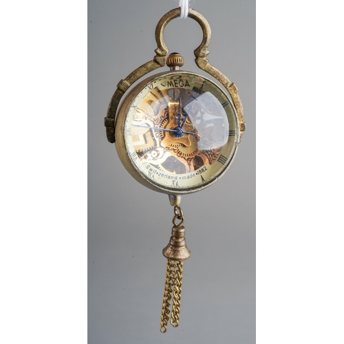 88 - A crystal ball pendant watch, stamped Omega