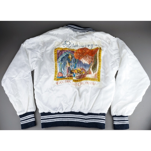 106 - E.L.O Memorabilia Fan Club and Tour items including :
Satin white jacket customised with a Discovery... 