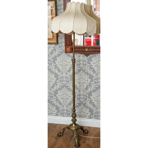 171 - Tall brass floor lamp on 3 feet with a large cream shade ( approx. height including shade 185 cm)