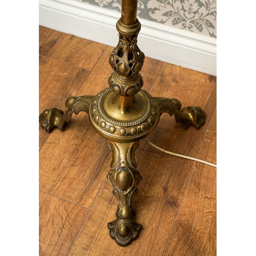 171 - Tall brass floor lamp on 3 feet with a large cream shade ( approx. height including shade 185 cm)