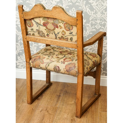 173 - Arts and crafts light oak chair with upholstered seat and back