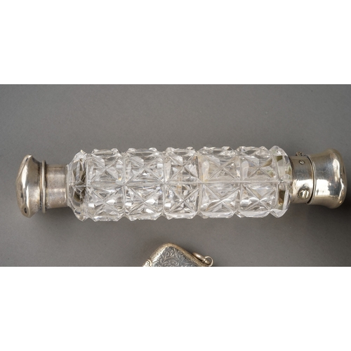 175 - A silver-mounted double cut glass scent bottle, approx 12.5cm long; a pair of silver open salts, wit... 