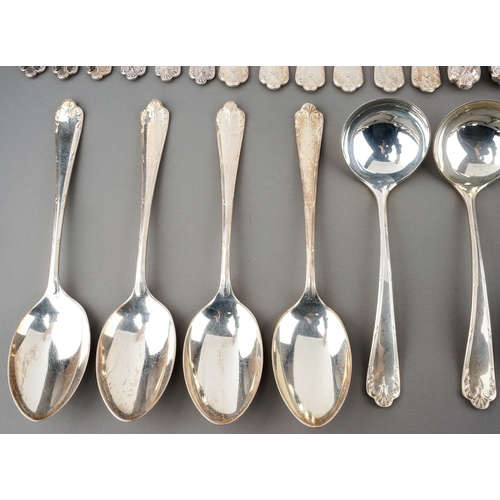 176 - A George V silver six piece / place flatware service comprising table forks, dessert forks, dessert ... 