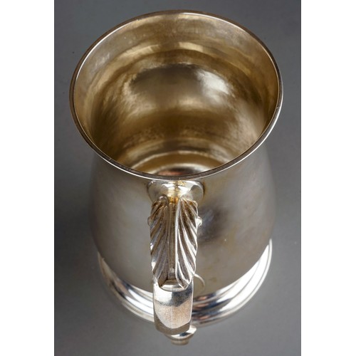 178 - A George III silver baluster tankard / mug on circular stepped foot, the body engraved with initials... 