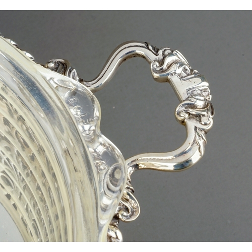 182 - A George V silver circular reticulated two handled bowl, rope twist borders with geometric pattern b... 