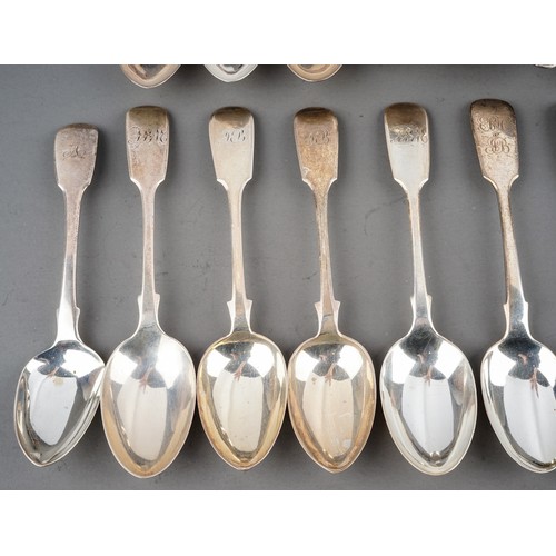 200 - A collection of 19th Century silver fiddle pattern flatware mainly teaspoons with two dessert spoons... 