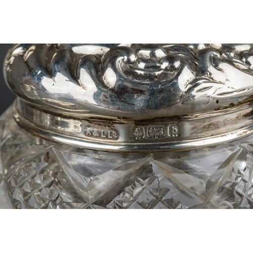 204 - A collection of six early 20th Century silver mounted dressing table jars and two silver mounted sce... 