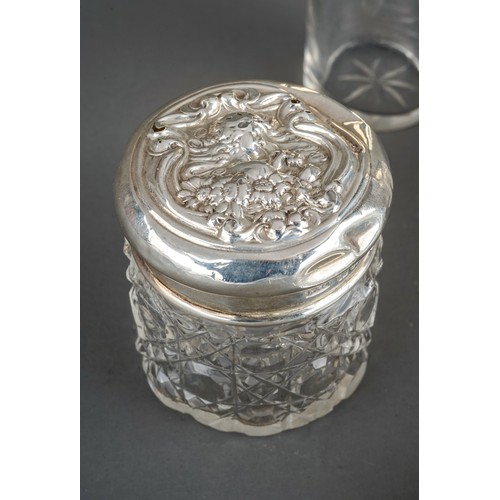 204 - A collection of six early 20th Century silver mounted dressing table jars and two silver mounted sce... 