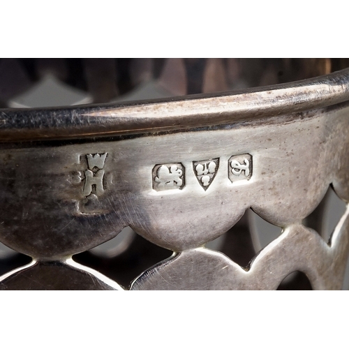 208 - A pair of Edwardian bright cut engraved silver napkin rings, with thistle decoration and central eng... 