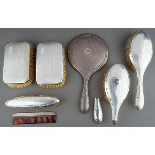 210 - A collection of early 20th Century silver mounted brushes and dressing table mirror, various dates a... 