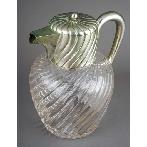 211 - An early 20th Century Austro-Hungarian 800 standard silver mounted glass claret jug, wyvern fluted t... 