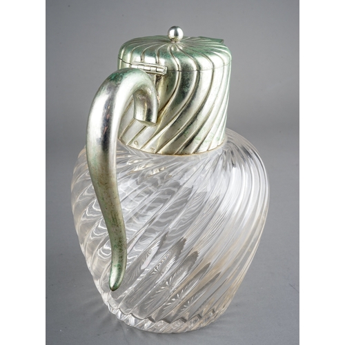 211 - An early 20th Century Austro-Hungarian 800 standard silver mounted glass claret jug, wyvern fluted t... 