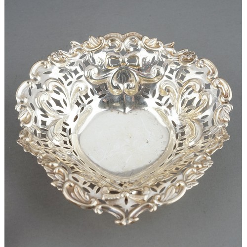 216 - A collection of late 19th/early 20th Century to include: bowl with crimped edges, heart shaped ring ... 