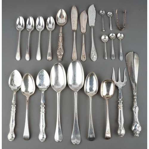 219 - A collection of silver flatware including Hanoverian table spoons, sugar nippers, teaspoons, butter ... 