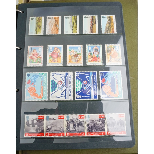 238 - A collection of approximately 440 Royal Mail stamp issue postcards presented in three purposed album... 