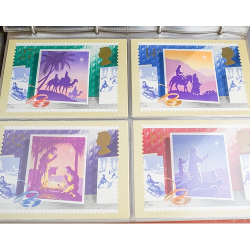 238 - A collection of approximately 440 Royal Mail stamp issue postcards presented in three purposed album... 