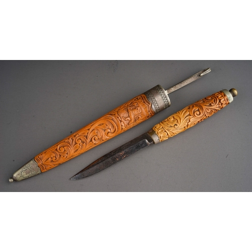 243 - Antique carved wooden Puukko knife and sheath.  Made by Magnus Hansen circa 1880.  Overall length in... 