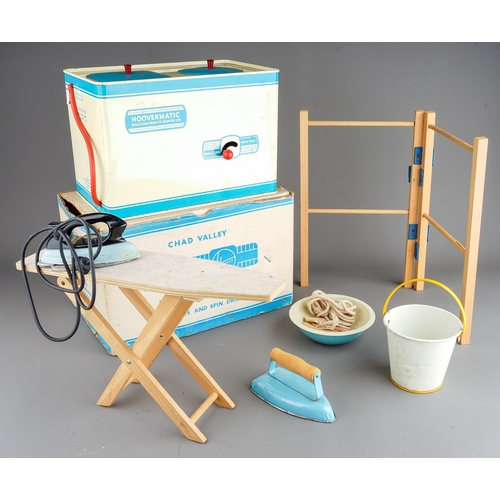 250 - A vintage boxed Chad Valley Hoovermatic washing machine and a vintage Toy ironing board, irons, buck... 