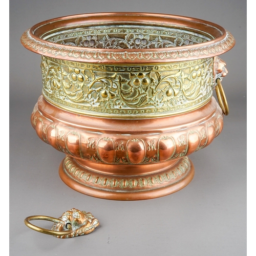 259 - A Middle Eastern brass and copper planter / jardiniere, chased with animals, flowers, foliage and la... 