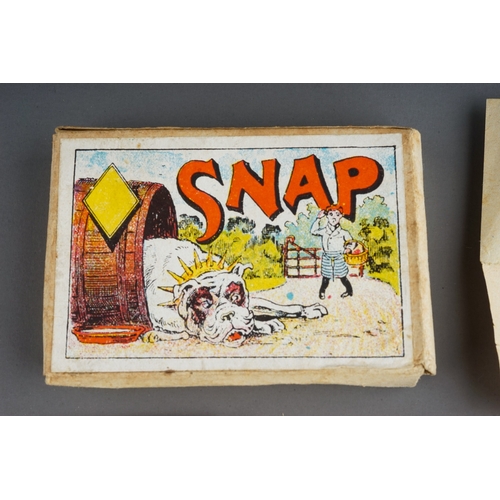 268 - An early 20th Century game of Snap cards (one Snapping card missing) with instructions and box