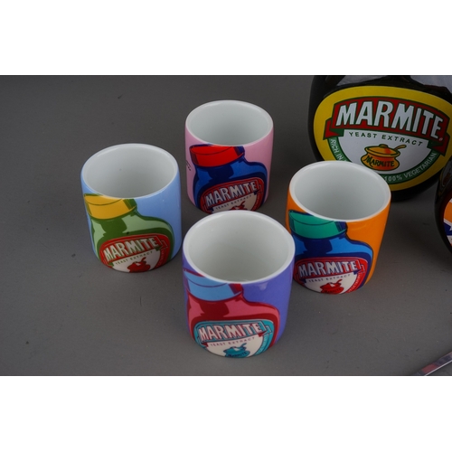 272 - Collection of Marmite memorabilia, to include, sealed jar of Marmite Limited Edition Gold jar, seale... 