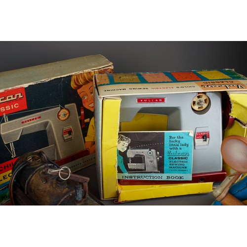 279 - Assorted vintage toys to include: boxed Vulcan Child's electric sewing machine; boxed Mamod Steam En... 