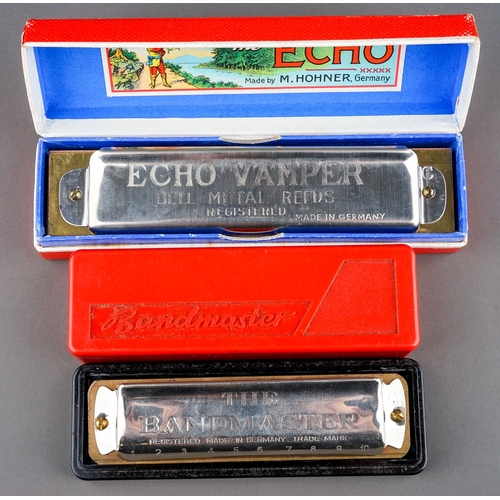 288 - A German boxed M Hohner Echo Vamper harmonica with Bell Metal Reeds and German The Bandmaster harmon... 