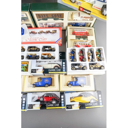 296 - Assorted boxed die cast model toy cars to include: 
BURAGO - Benetton F1 and Williams FW 08C Turbo
C... 